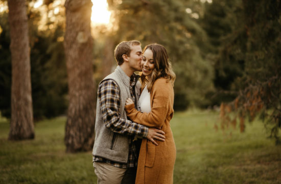 couple hugging during fall sunset