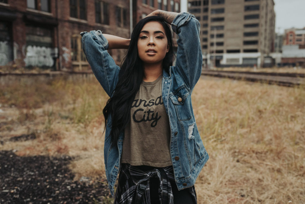 women modeling kansas city shirt in urban location