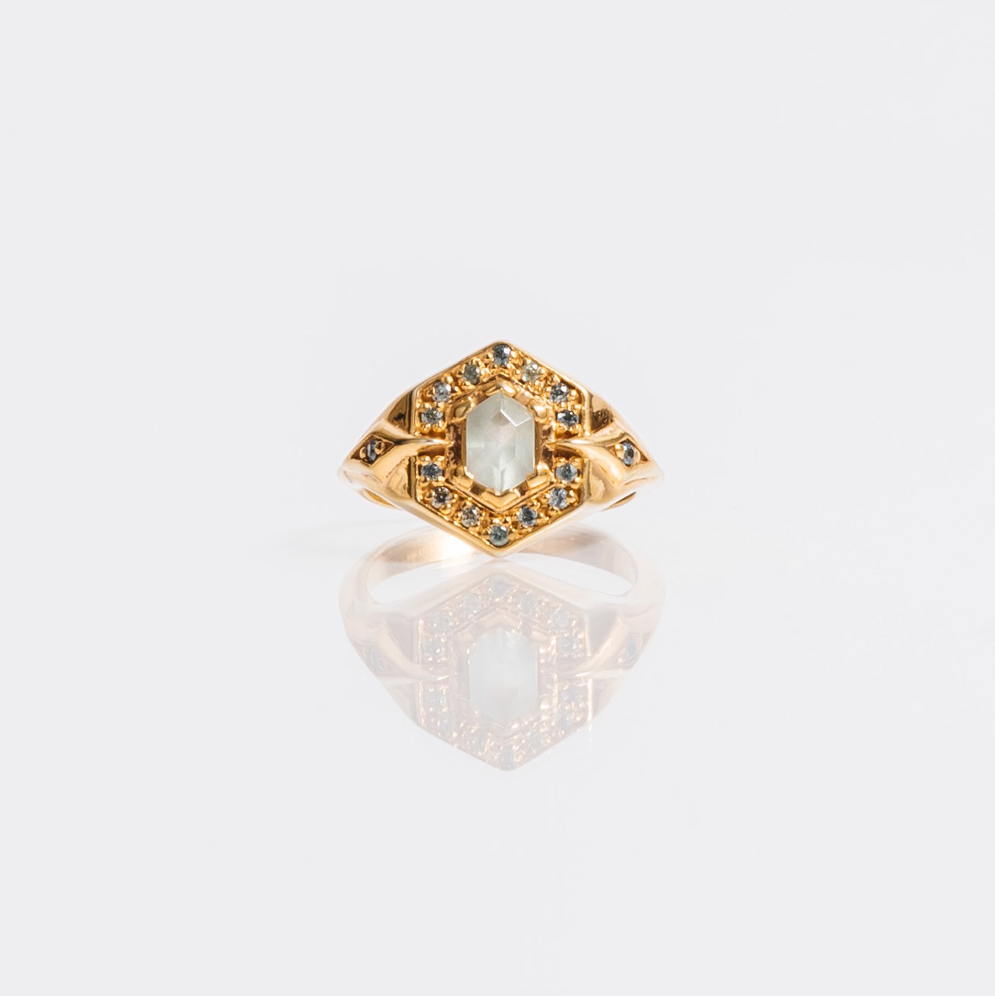 e-commerce product photo of gold ring