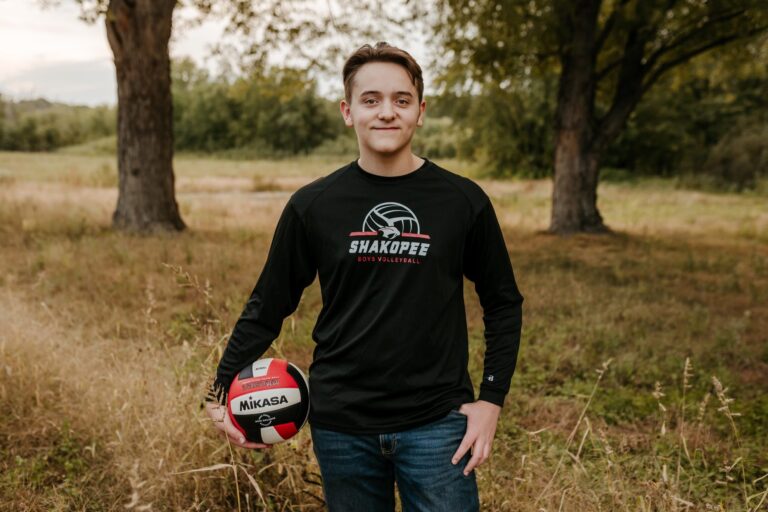 high school senior photo of male volleyball player